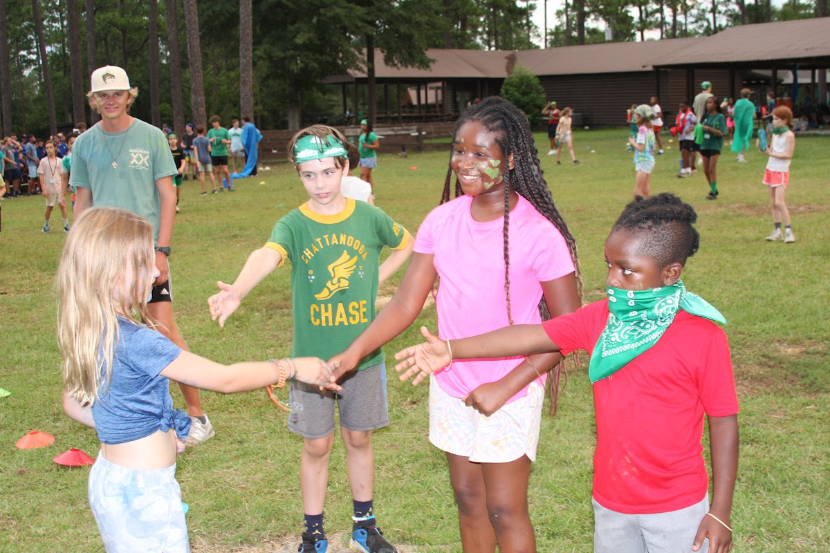 Campers playing games on the field